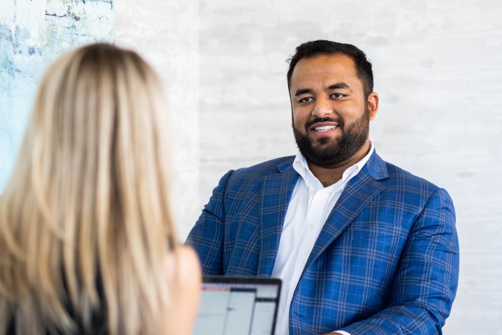 Man talking to a woman.